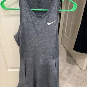 Gray Nike tennis dress worn once. Size small.